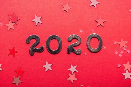 Happy New Year 2020 on bright red backgroundの写真素材