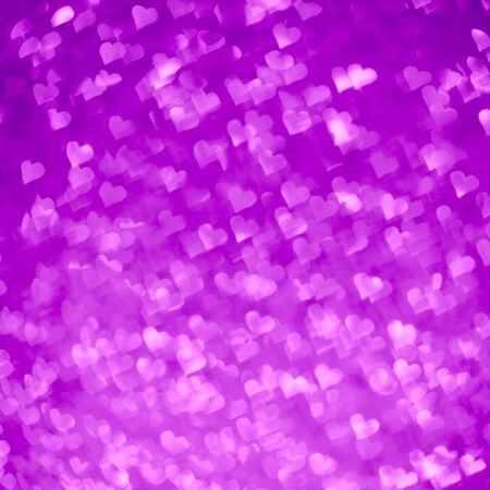 Abstract light, purple bokeh pattern in heart shape. St Valentides Day or Holiday concept,...