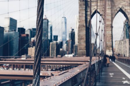 Details of the Brooklyn Bridge in New York City, USA. Toned in cooler color imageの写真素材