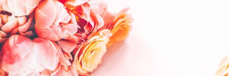 Fresh bunch of pink peonies and roses on pink background. Card Concept, pastel colors, close up...
