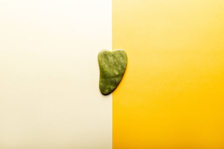 Gua sha stone for beauty facial massage therapyの写真素材