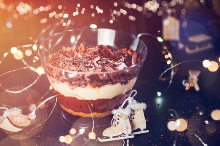 Pot of Irresistible Layered Billionaires Dessert made from mousse, Belgian chocolate sauce, and chocolate sponge. Finished with choco chunks and decorated with icing. Traaditional Xmas treatの写真素材