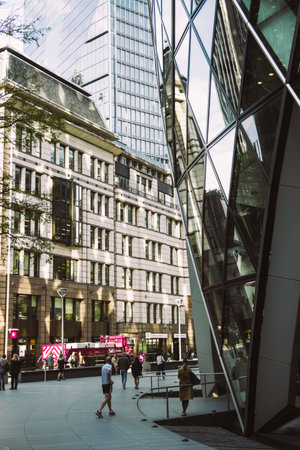 London, UNITED KINGDOM - OCTOBER 15, 2019 : Busy streets in London City. Glass skyscrapers and old buildings in one of the worlds biggest financial districtsのeditorial素材