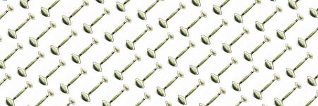 Pattern made from Jade face roller for beauty facial massage therapy, isolated imageの写真素材