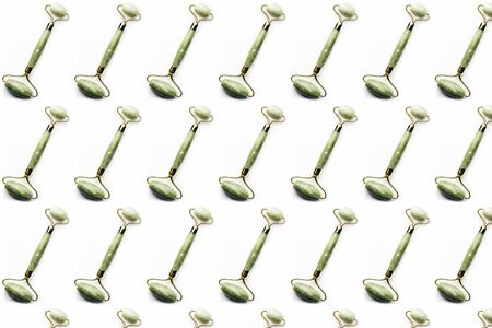 Pattern made from Jade face roller for beauty facial massage therapy, isolated imageの写真素材