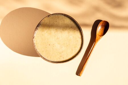 Healthy Smoothie from Banana, Pineapple and gluten free oats in the Coconut Shell Bowl, strong...