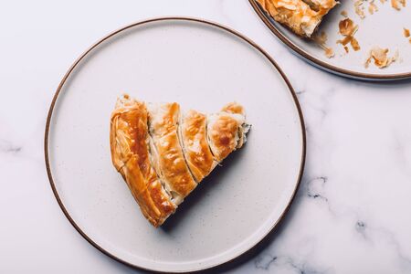 Filo Spinach and Feta Twist Pie in the plate freashly baked at homeの写真素材