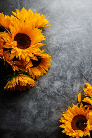 Yellow Sunflower Bouquet on grey Background, Autumn Concept, Top View, Space for Textの写真素材