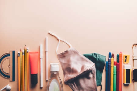 Preparation for going back to school with usual stationery and new normal such as face mask and hand cleanser gelの写真素材