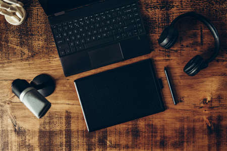 Preparation for online lecture using laptop and graphic tablet and writing materials with stylus penの写真素材