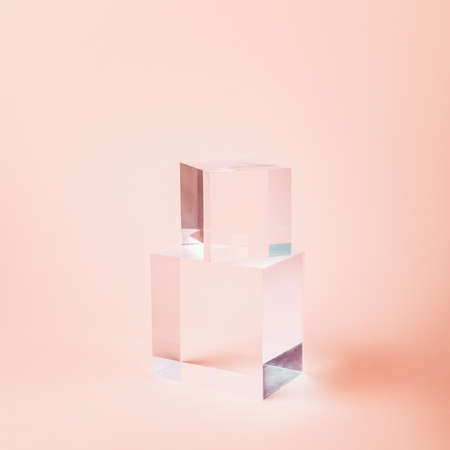 Acrylic Solid Display Block for Shop Windows on pink background, empty podium for product...