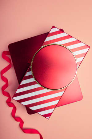 Reusable Red and white boxes for presents in different shapes, gift wrapping and preparation for the festive holidays seasonの写真素材