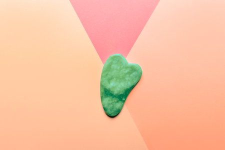 Gua sha stone for beauty facial massage therapyの写真素材