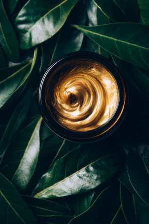 Trendy Gold face mask in jarの写真素材