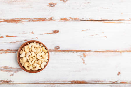 Cashew nuts in wooden bowlの写真素材