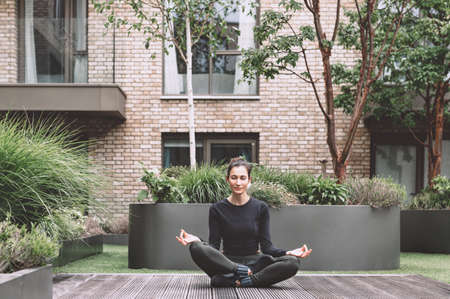 Young woman doing yogaの写真素材