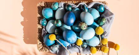 Homemade naturally dyed eggs in blue colors