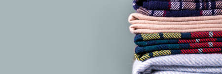 Stack of woolen checked blankets