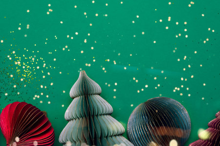 Trendy decorative paper Christmas tree baubles, DIY project, Organic Modern Design, Hanging Festive Honeycomb Foldable 3D balls, minimalist and plastic freeの写真素材