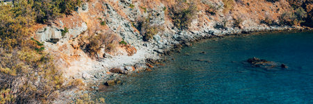Kionia Beach swimming, the place to embrace the Aegean Sea, Tinos, Greece, banner size