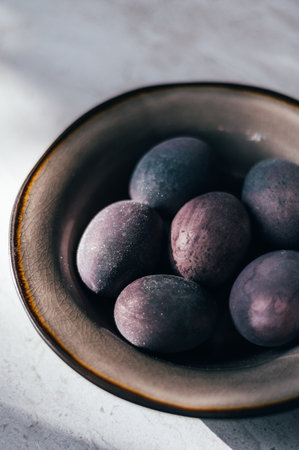 Sparkling Easter eggs dyed with natural ingredients such as red wine. Homemade naturally dyed eggs. Healthy eco option.の写真素材