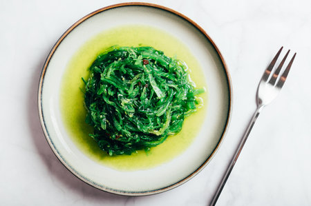 Seaweed Salad is Super Healthy and Nutritious Snack with sesame seeds, dietary supplement, superfood of the sea, Green Chuka or Algaeの写真素材