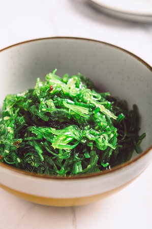 Seaweed Salad is Super Healthy and Nutritious Snack with sesame seeds, dietary supplement, superfood of the sea, Green Chuka or Algaeの写真素材