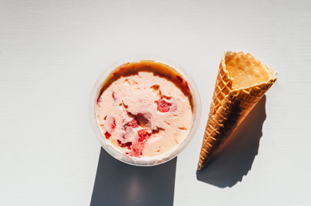 Easy Homemade no-churn strawberry ice cream in pot. Delicious and easy to make at home ice cream...