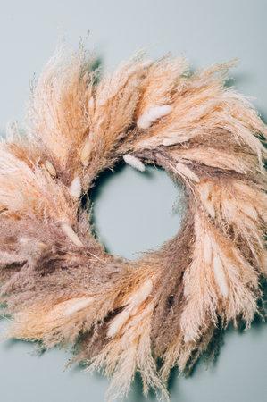 Wreath from Reed Plume Stem, Dried Pampas Grass, Decorative Feather Flower Arrangement for Home on Wall, New Trendy Home Decorの写真素材