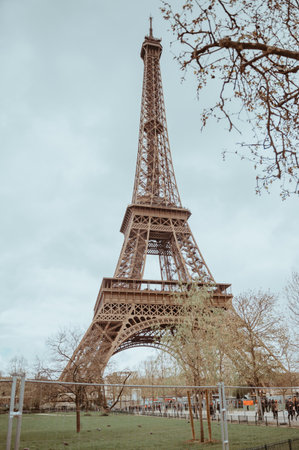 Paris, France - March 30, 2024: Eiffel Tower as a symbol of France culture, shot during rainy day in early springのeditorial素材