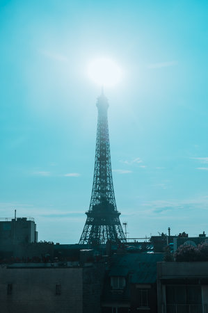 Eiffel tower in Paris, France during sunrise with Sun on its topの写真素材