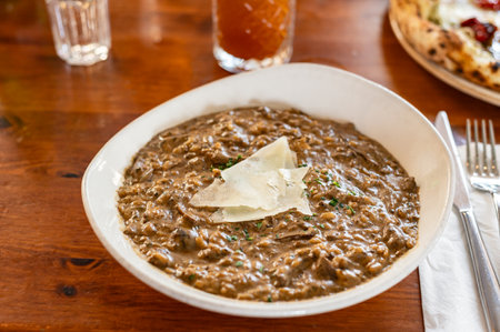 Mushroom Risotto with parmesan cheese served in restaurantの写真素材