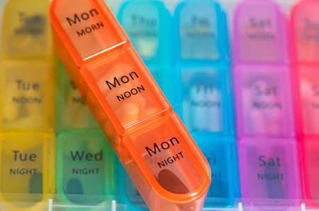 7 Day Weekly Pill Box for 3 Times a Day (Morning, Noon, Night), Daily Portable Travel Pill Box Organiser with different pills or vitamins insideの写真素材