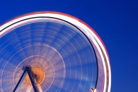 ferris wheel in motionの写真素材