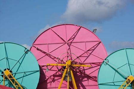 three colorful metal disksの写真素材