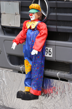 Mannheim, Germany - February 15, 2015: Fastnachtsumzug - carnival parade - traditional public event in the streets of Mannheim drew a crowd of 300.000 viewers. Puppet on front of parade truck.のeditorial素材