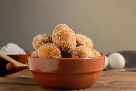 Fried fritters covered in sugar. Typical of Argentine homemade pastries.