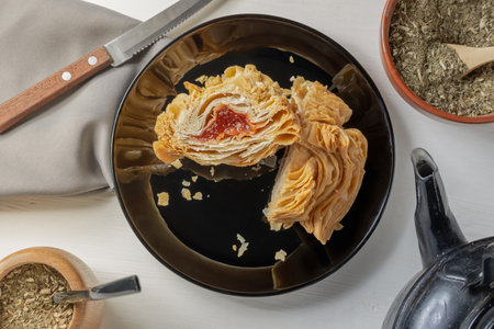 Food of Argentine culture. Fried dessert filled with quince paste or sweet potato paste.