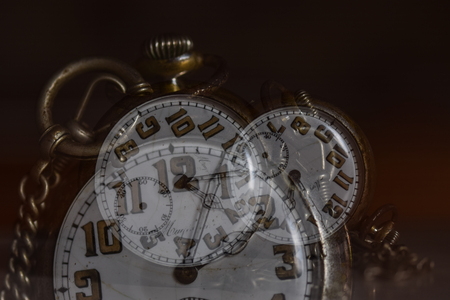 stylish pocket watch, time concept fading awayの写真素材