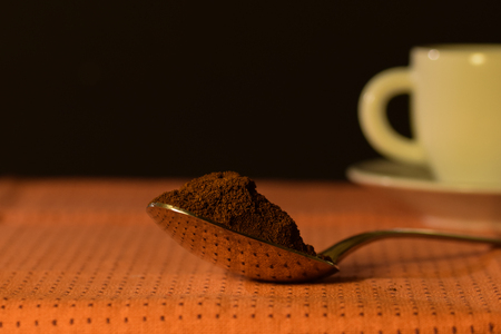 coffee breaks, a spoon of ground coffeeの写真素材