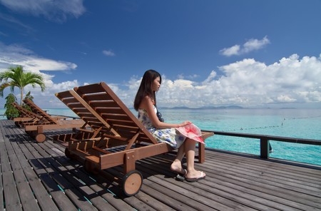 Asian girl during holiday at beautiful islandの写真素材