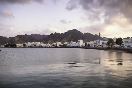 Muscat Cityscape at sunset with it'l lights, Oman.