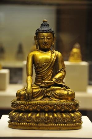 Gilt bronze Shakyamuni Buddha statueのeditorial素材