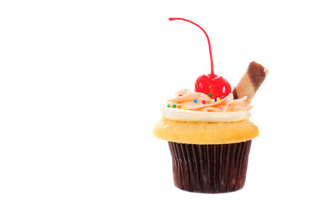 cherry chocolate cupcake on white backgroundの写真素材