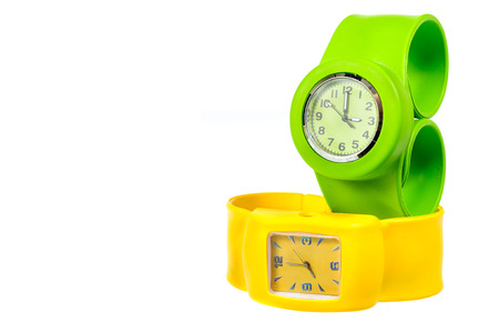 Yellow and green  wrist watch isolated on white backgroundの写真素材