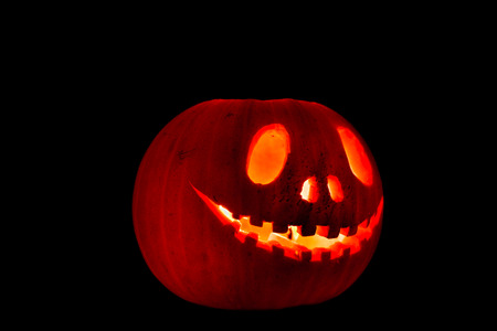 Halloween pumpkin on dark backgroundの写真素材
