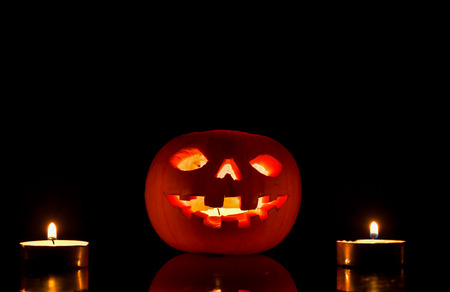 Halloween pumpkin on dark backgroundの写真素材