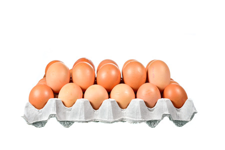 Egg in the package isolated on white background
