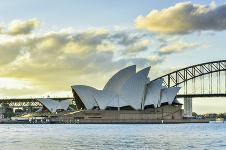 SYDNEY AUSTRALIA - February 6, 2015 : View of sunset at Sydney Opera House on February 6 in Sydney, Australia. Over 10 millions tourists visit Sydney every year, making Sydney one of the world's top tourist destinations.のeditorial素材