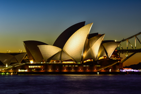 SYDNEY AUSTRALIA - March 6, 2015 : View of sunset at Sydney Opera House on March 6 in Sydney, Australia. Over 10 millions tourists visit Sydney every year, making Sydney one of the world's top tourist destinations.のeditorial素材